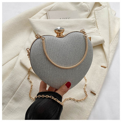 Heart-Shaped Evening Clutch Bag for Women – Shiny Metal Handbag with Chain Strap, Luxury Crossbody Purse for Parties